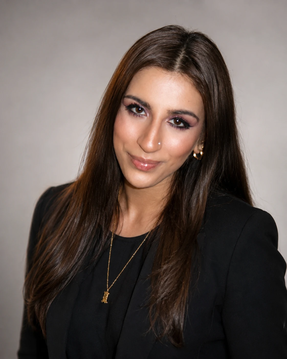 Professional portrait of Rania Mujib